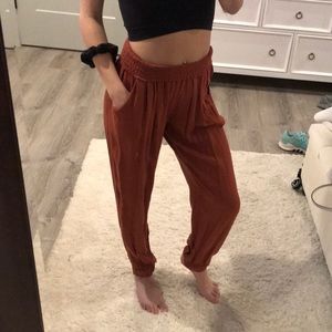 Deep orange colored hippie pants